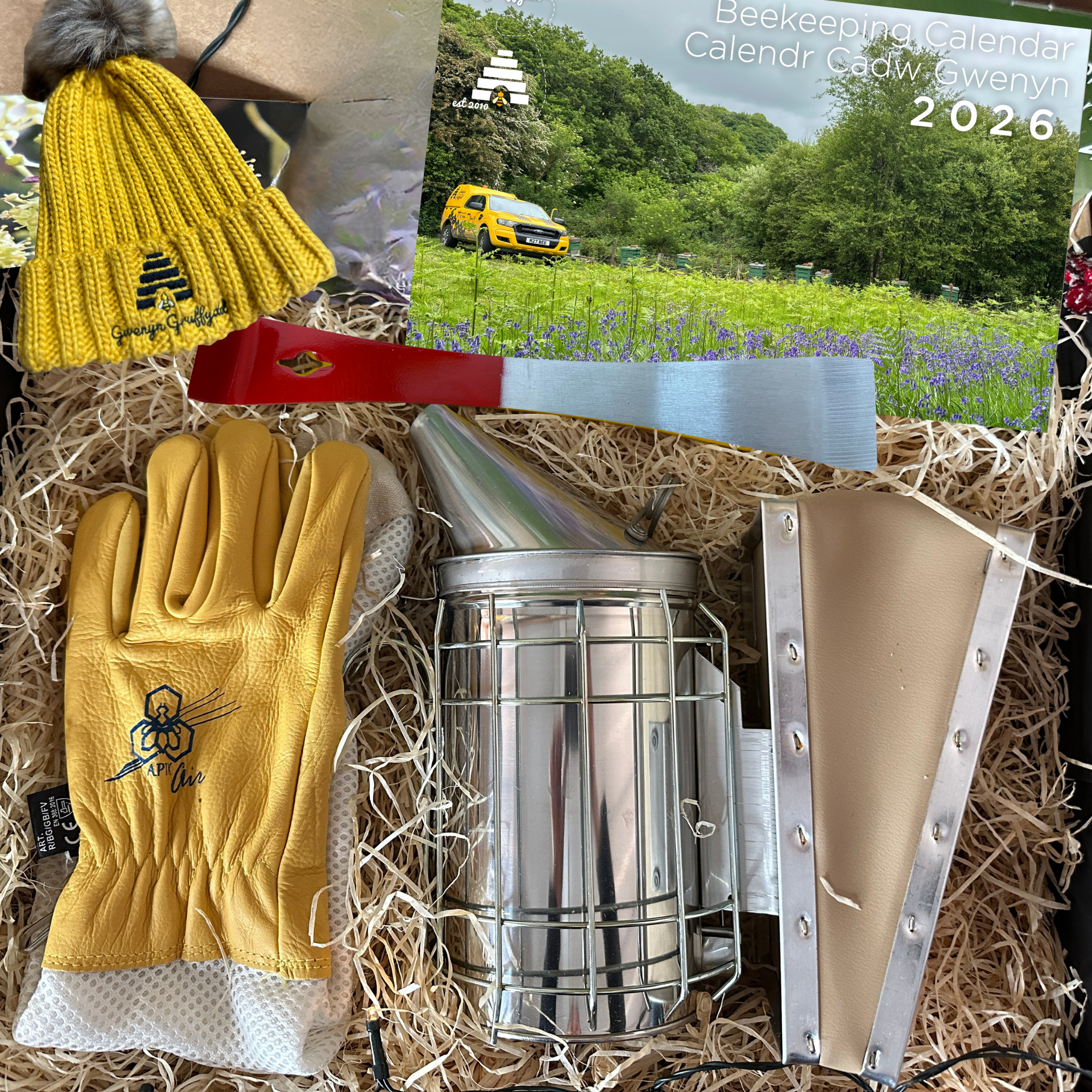 Luxury beekeeping gift sets including beginner beekeeper kits, Dadant smoker sets, beesuit starter gifts, and beekeeping accessories by Gwenyn Gruffydd