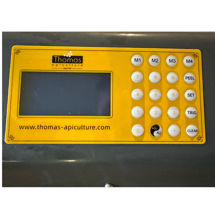 Electric Bottle Filling Machine - Thomas Apiculture - Bottling Liquid and Cream Honey